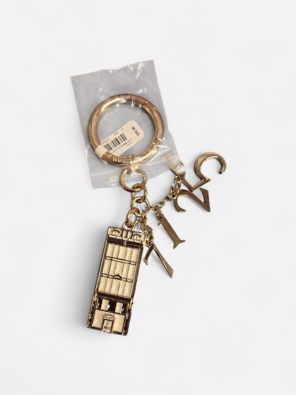 RARE Henri Bendel Gold Flagship Store Keychain NWT